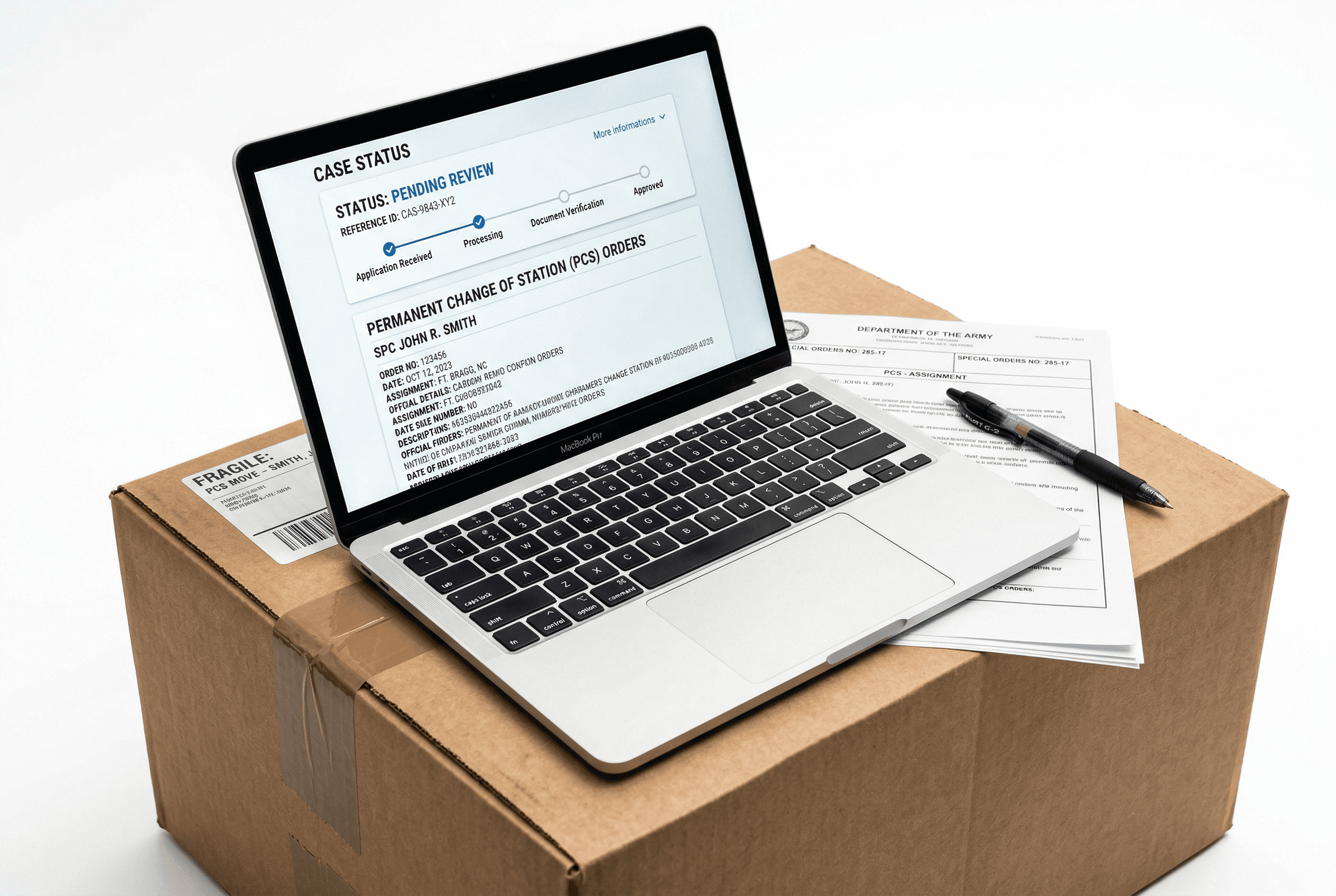 Laptop on moving box with military PCS orders during a move