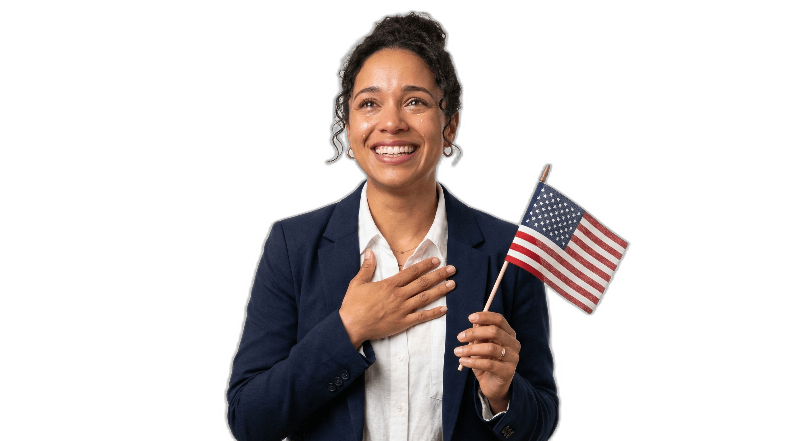 Woman holding an American flag with her hand on her chest, tears of joy after receiving citizenship.